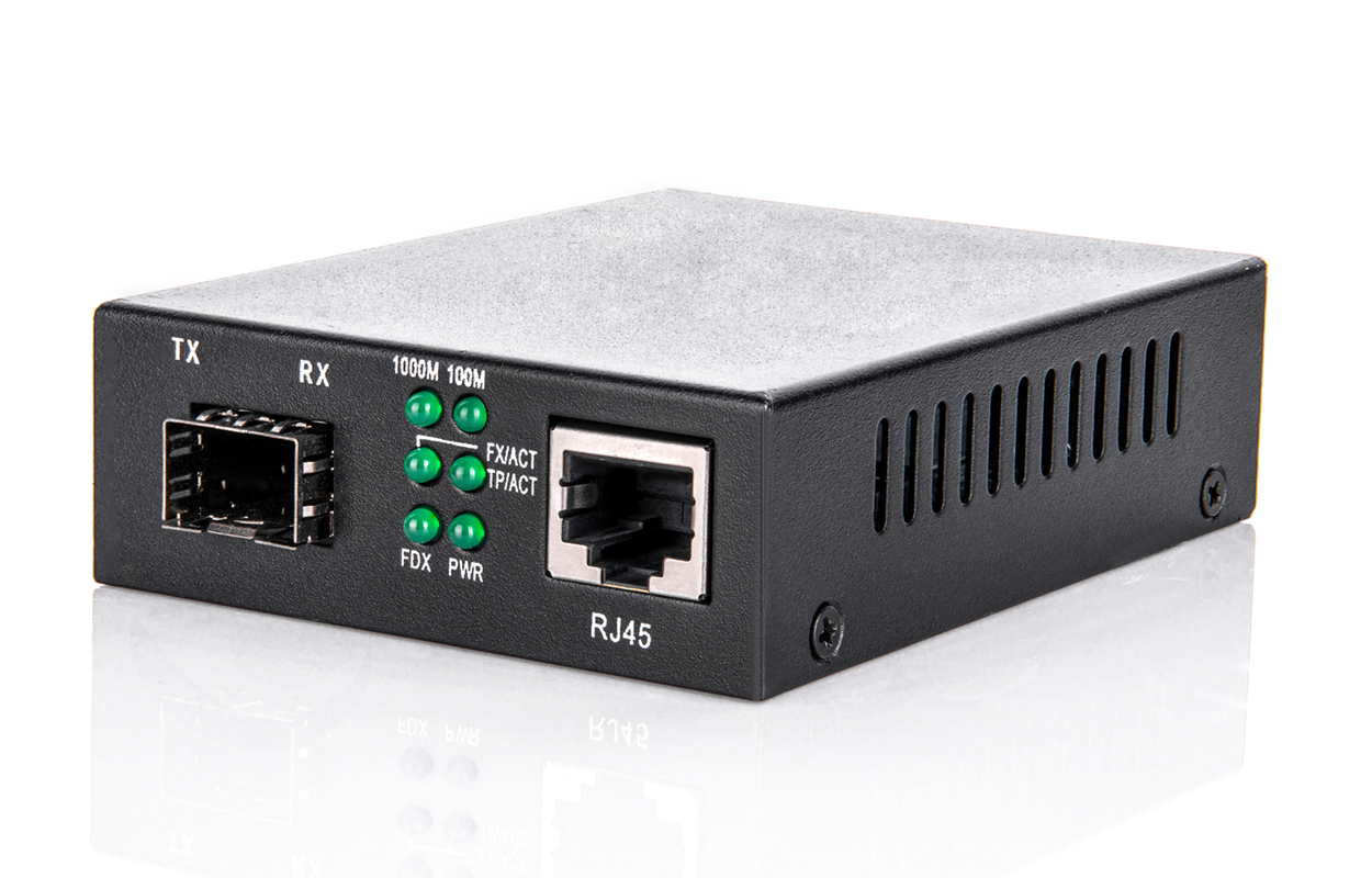 A media converter has a rectangular body with a port on the left labeled ‘TX’ and ‘RX’ and an RJ45 port on the right. The media converter has six indicator lights arranged in two columns between these ports. The top row of lights is labeled ‘1000M’ and ‘100M’, while the middle row is labeled ‘FX/ACT’ and’ TP/ACT’, and the bottom row is labeled ‘FDX’ and ‘PWR’.