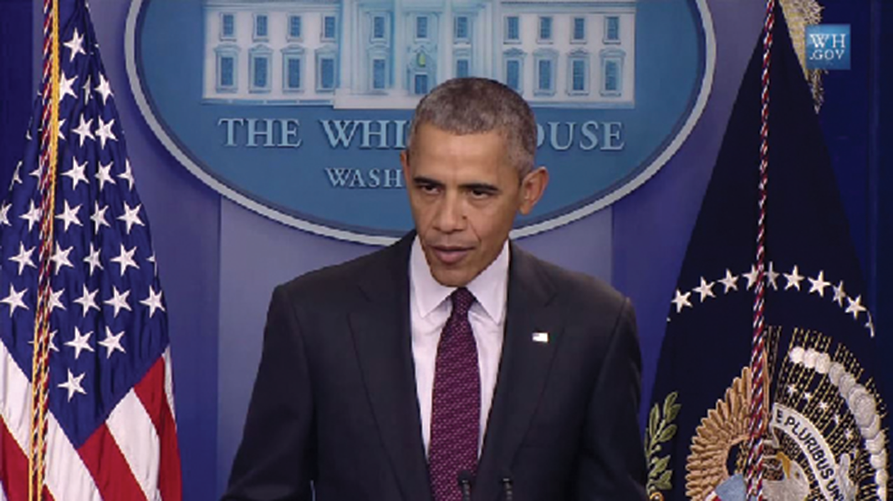 Photo shows President Obama giving a Press room briefing in the White House.