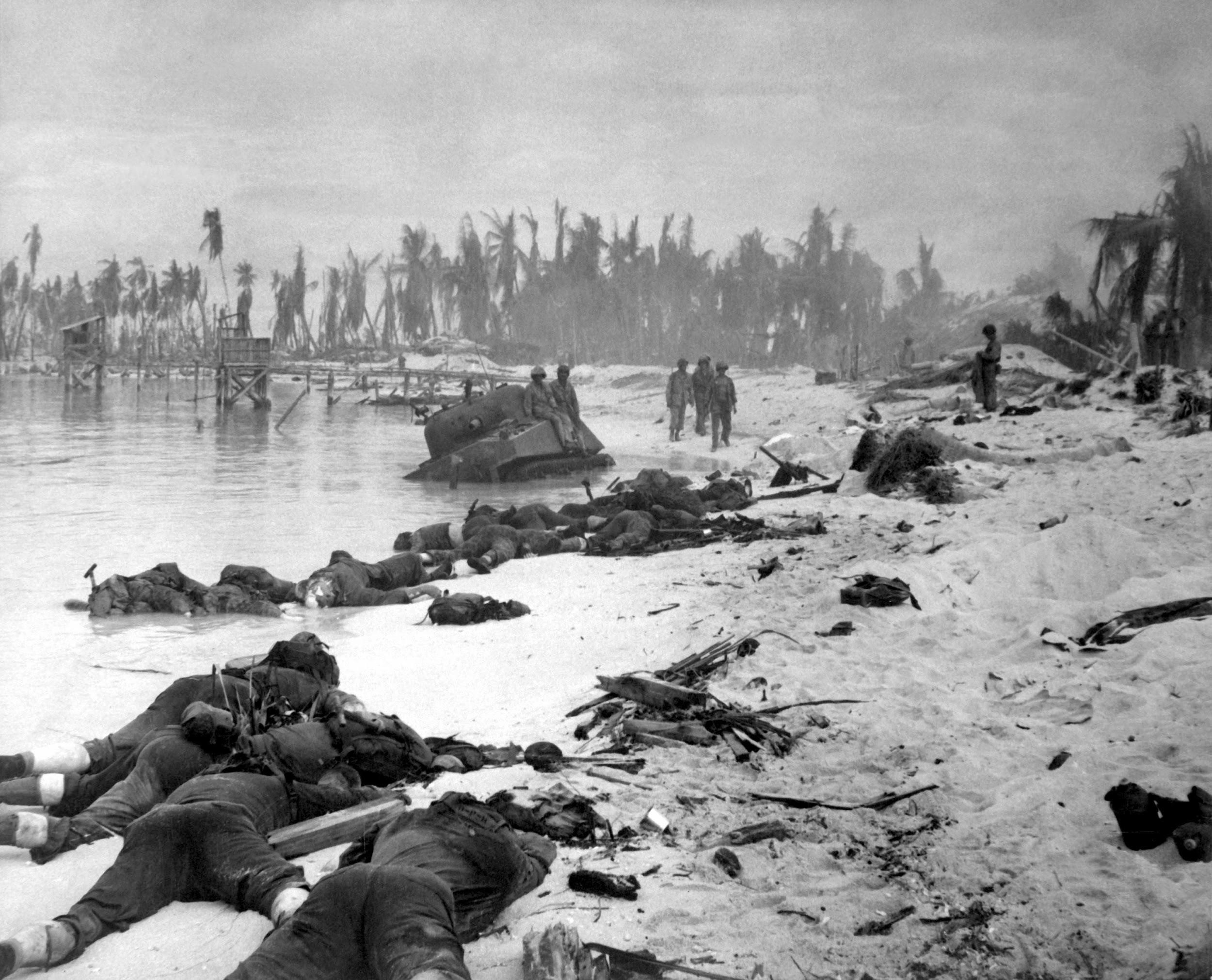 A photograph of dead American soldiers following an assault on Tarawa Atoll in the Central Pacific (November 1943). Over 900 American marines died during the battle, while the Japanese lost over 4,000 men.