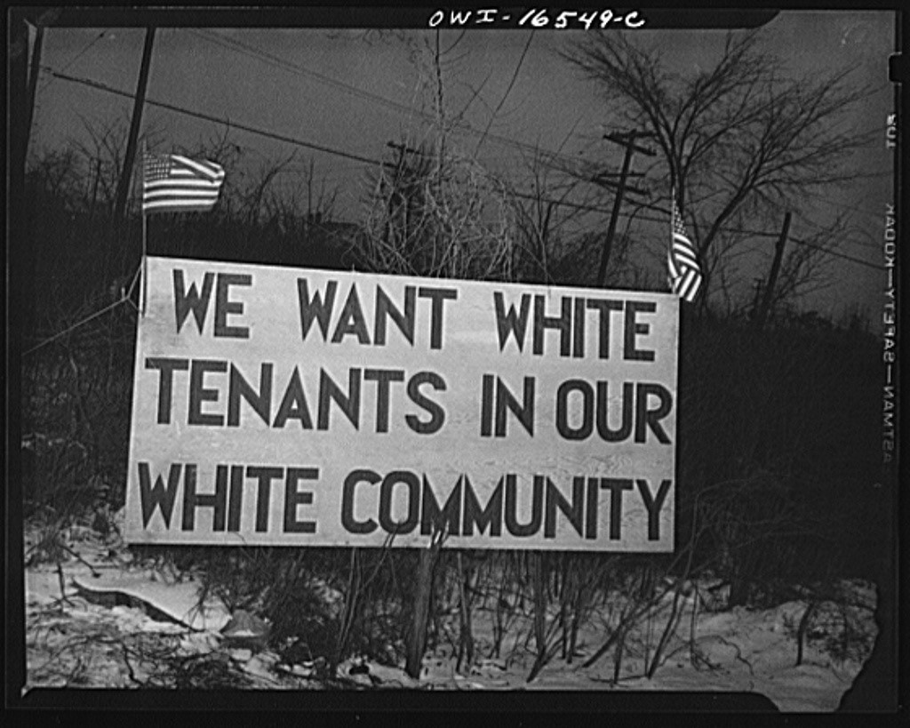 White tenants: a Detroit sign.