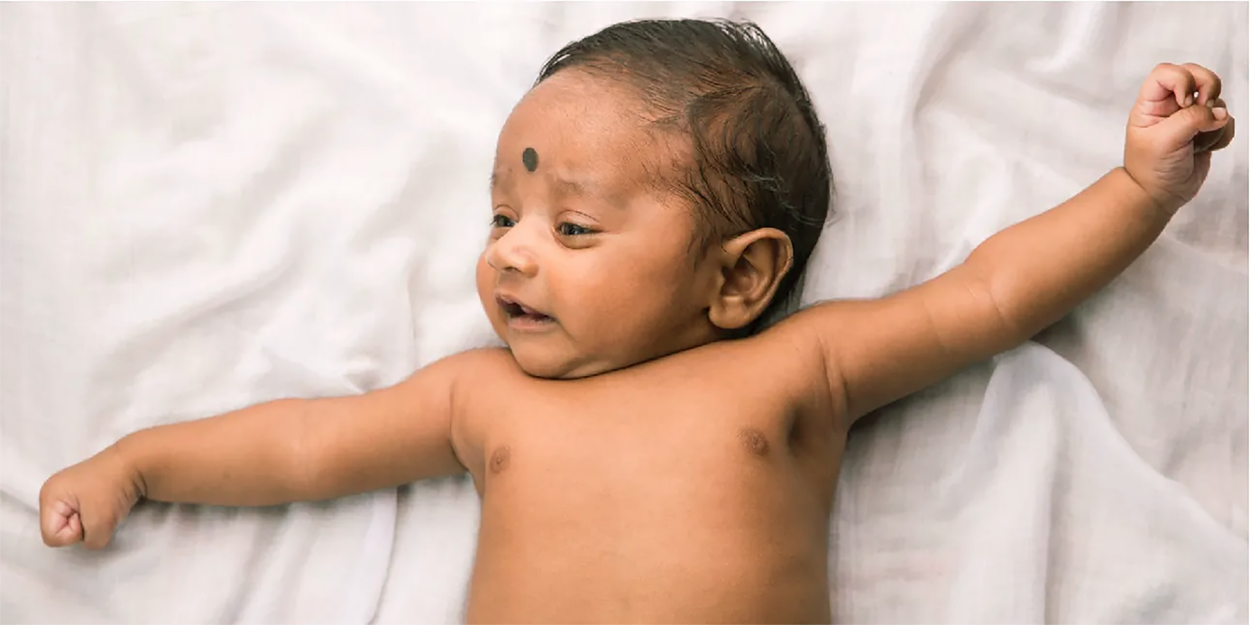 This photograph shows a newborn baby.