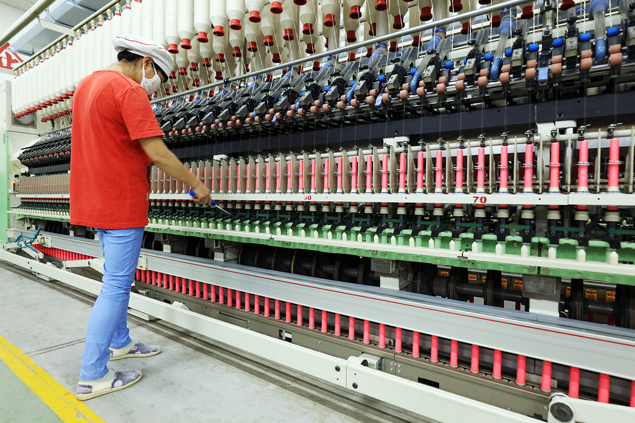 cotton being spun into fabric