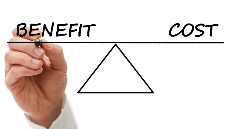 A hand drawing a seesaw diagram with the word “Benefit” on the left and “Cost” on the right, balanced on a triangle.
