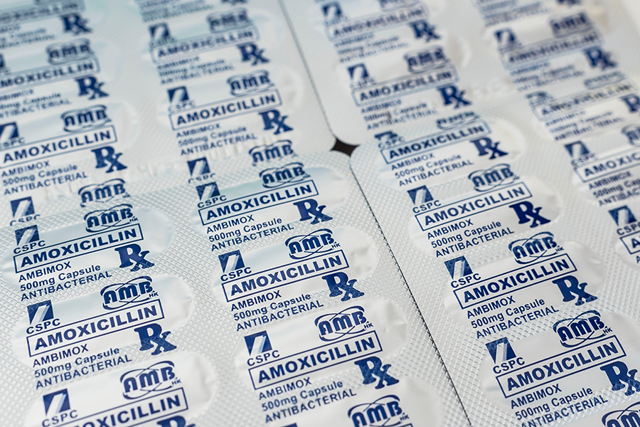 Blister packs of Amoxicillin capsules labeled AMBIMOX 500mg Capsule – Antibacterial.