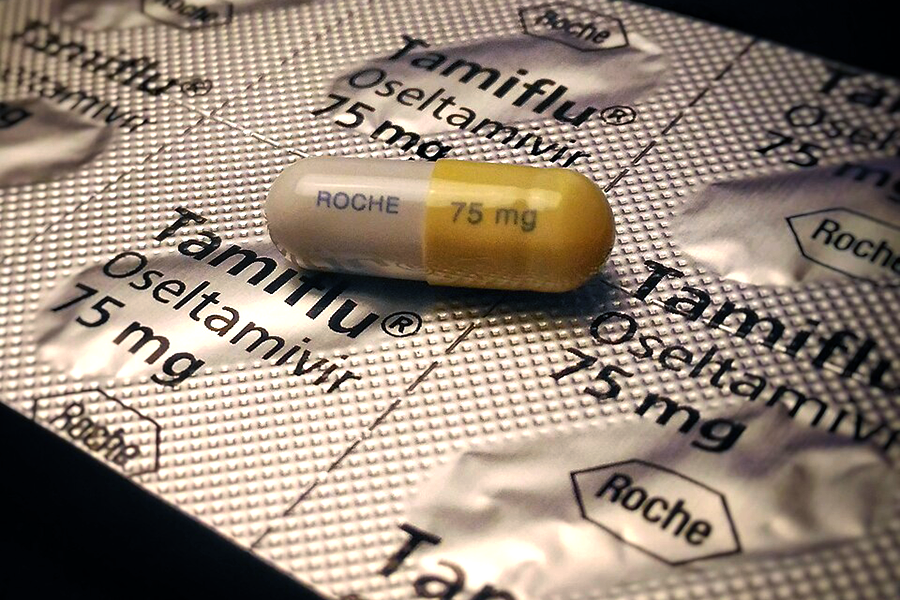 A blister package of capsules labeled as Tamiflu, oseltamivir, 75 mg, Roche.