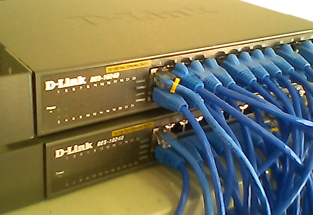 Network switch with multiple Ethernet ports, directing data to specific devices.