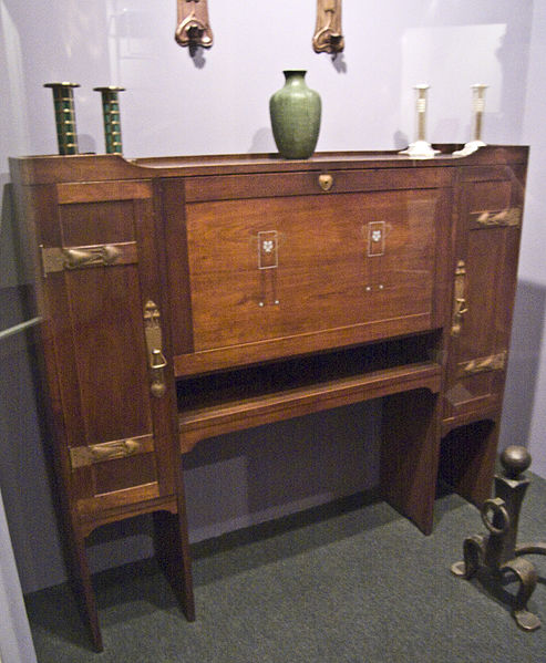 Desk by Gustav Stickley1904Walnut, inlaid copper, and pewter Desk by Gustav Stickley1904Walnut, inlaid copper, and pewter
